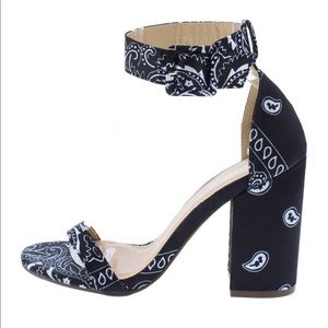 A very stylish pair of bandana patterned heels